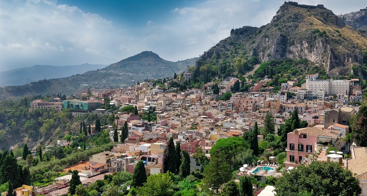 https://www.proudofsicily.com/wp-content/uploads/2021/11/Taormina-Photo-by-Alexis-Subiasa-on-unsplash-1200x640.jpg